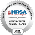 Badge says HrSA Health Center Quality Leader 2024 awardee