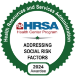 Badge says HRSA Addressing social risk factors 2024 awardee